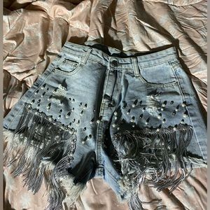 Pair shorts size large they have pearls on them and sequence strings